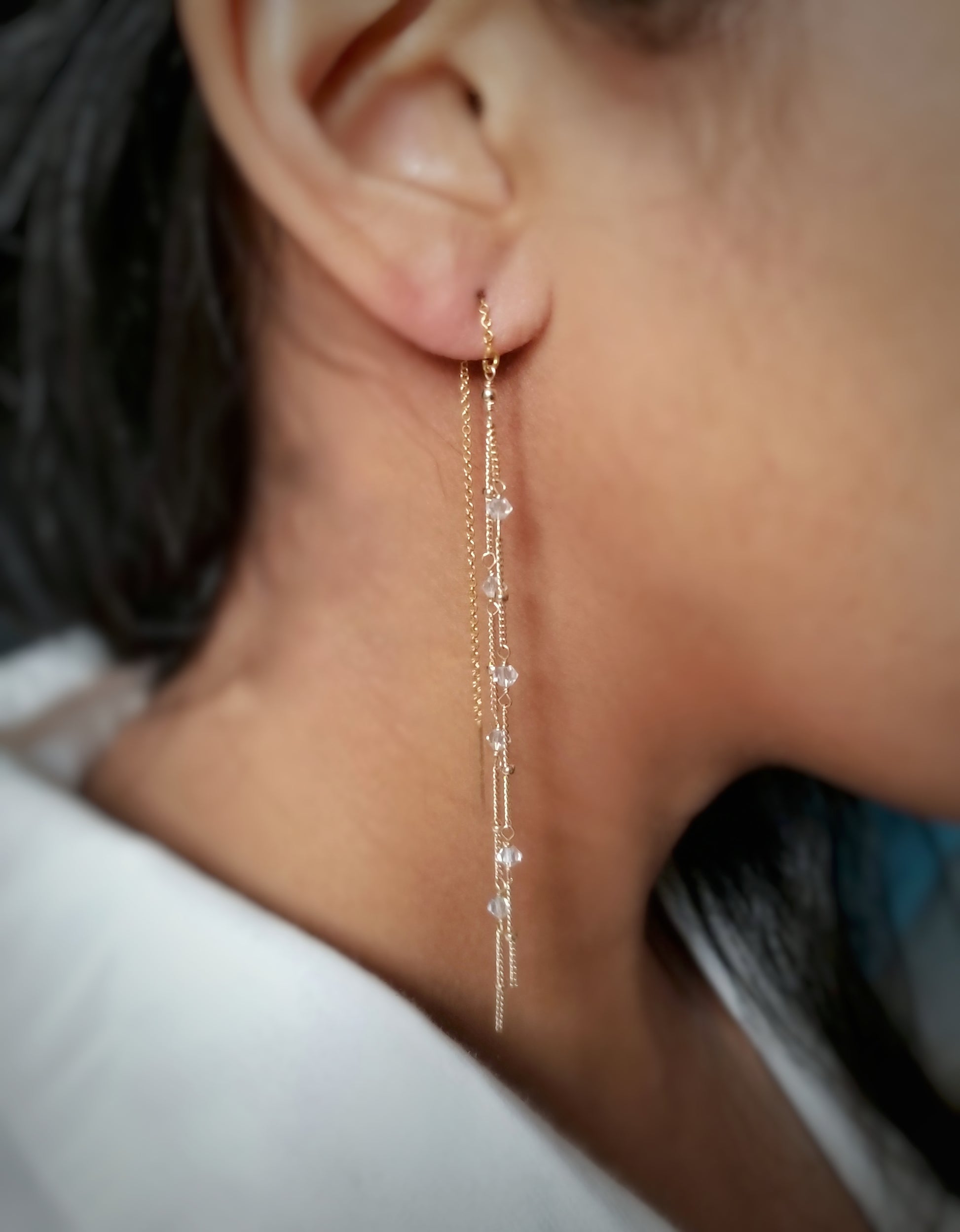 model wearing gold filled swarovski crystal threader earrings