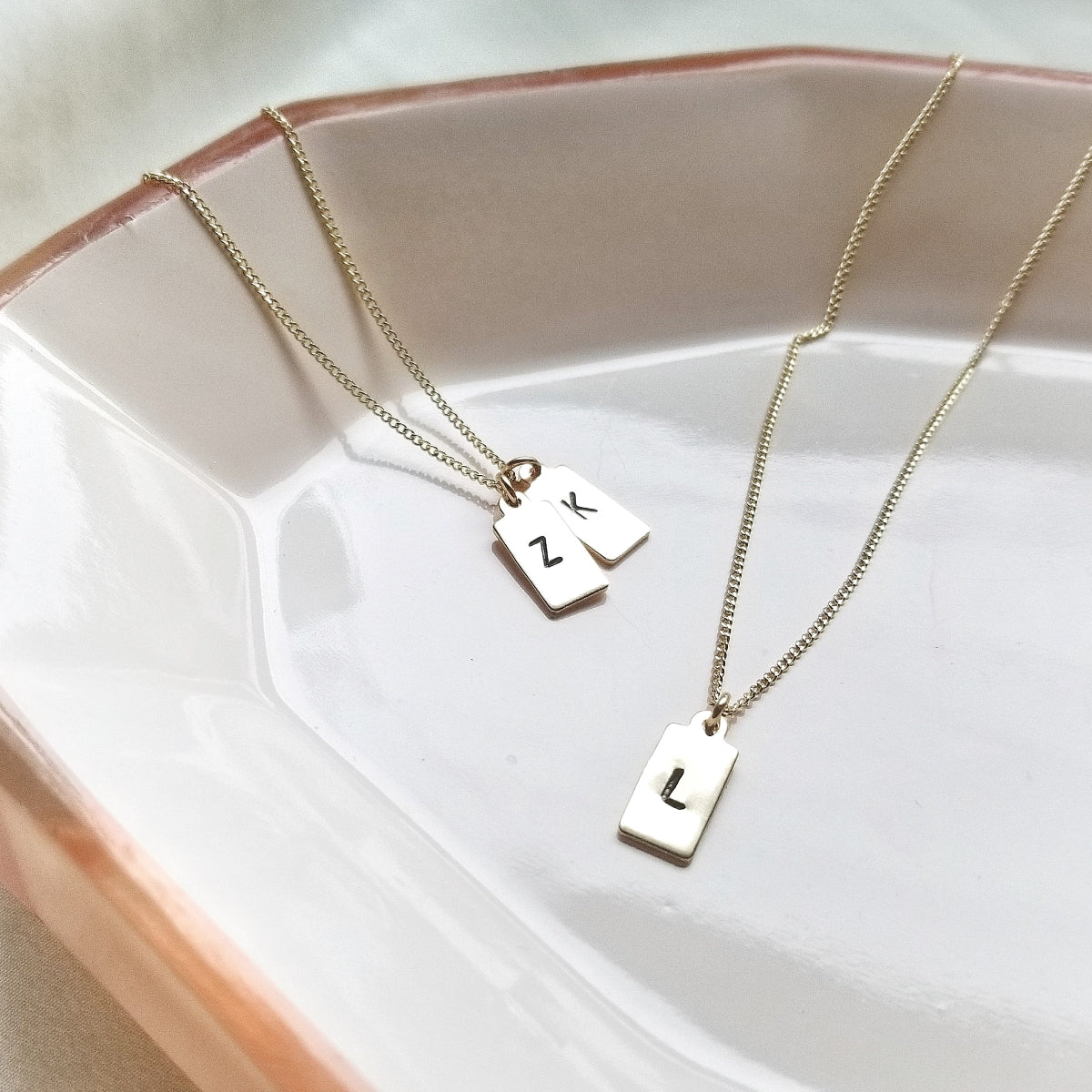 Stamped initial gold tag necklace
