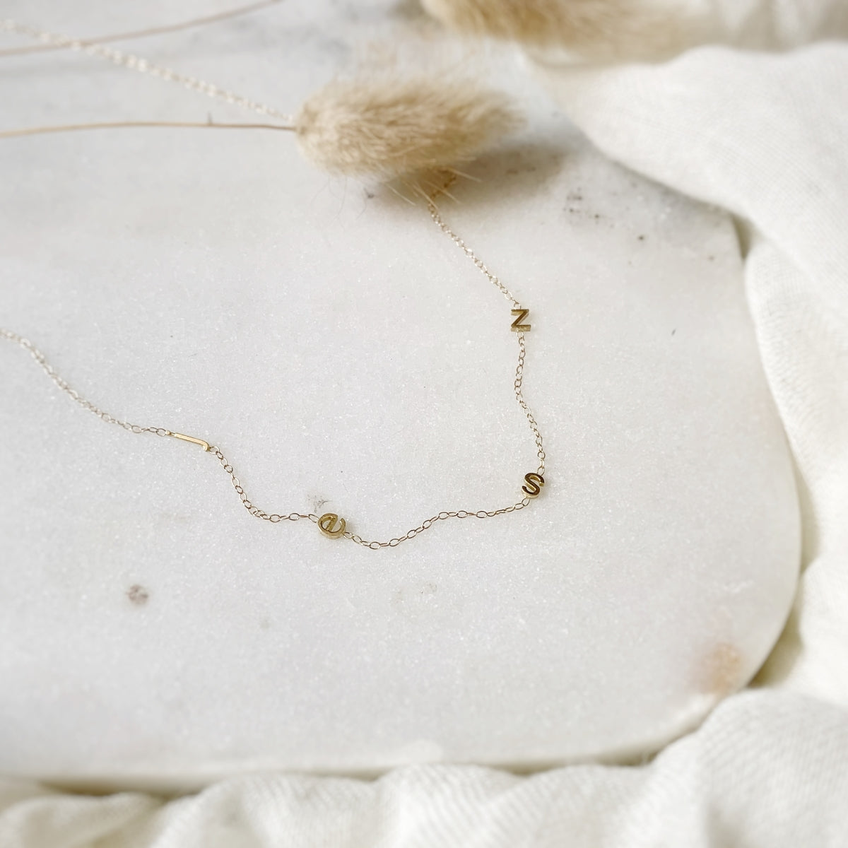 Custom 14KT gold sideways initial necklace