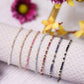 gold moonstone, champagne zircon, ruby, amazonite, garnet, aquamarine, black onyx morse code beaded bracelets